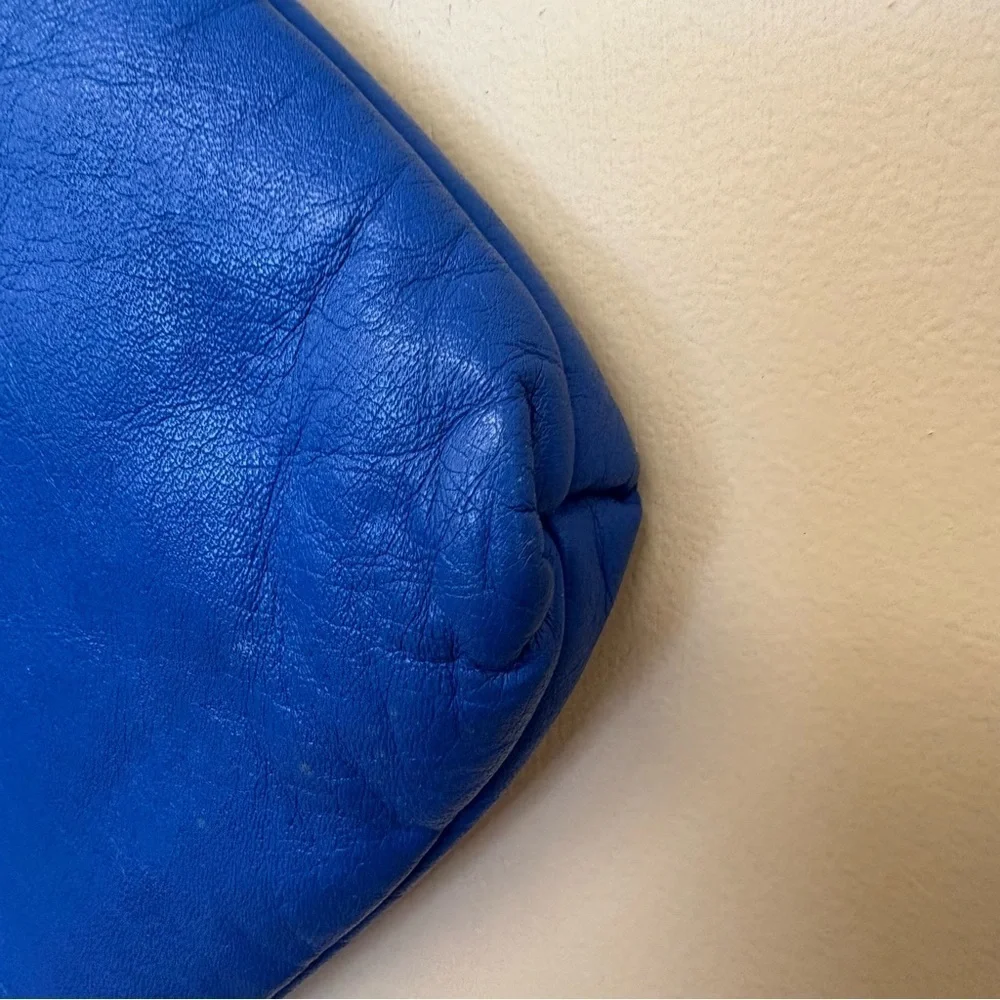 Vintage Toni blue genuine leather wristlet with bow.